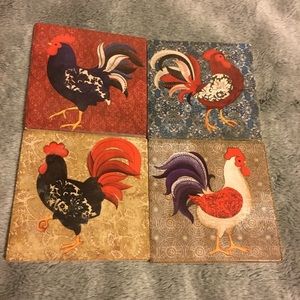 A set (four) of rooster saucers